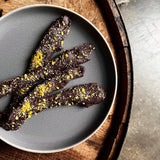 Chocolate-Dipped Bacon with Cayenne + Pistachios