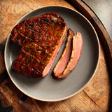 Smoked Magret Duck Breast with Saffron + Grand Marnier Sauce